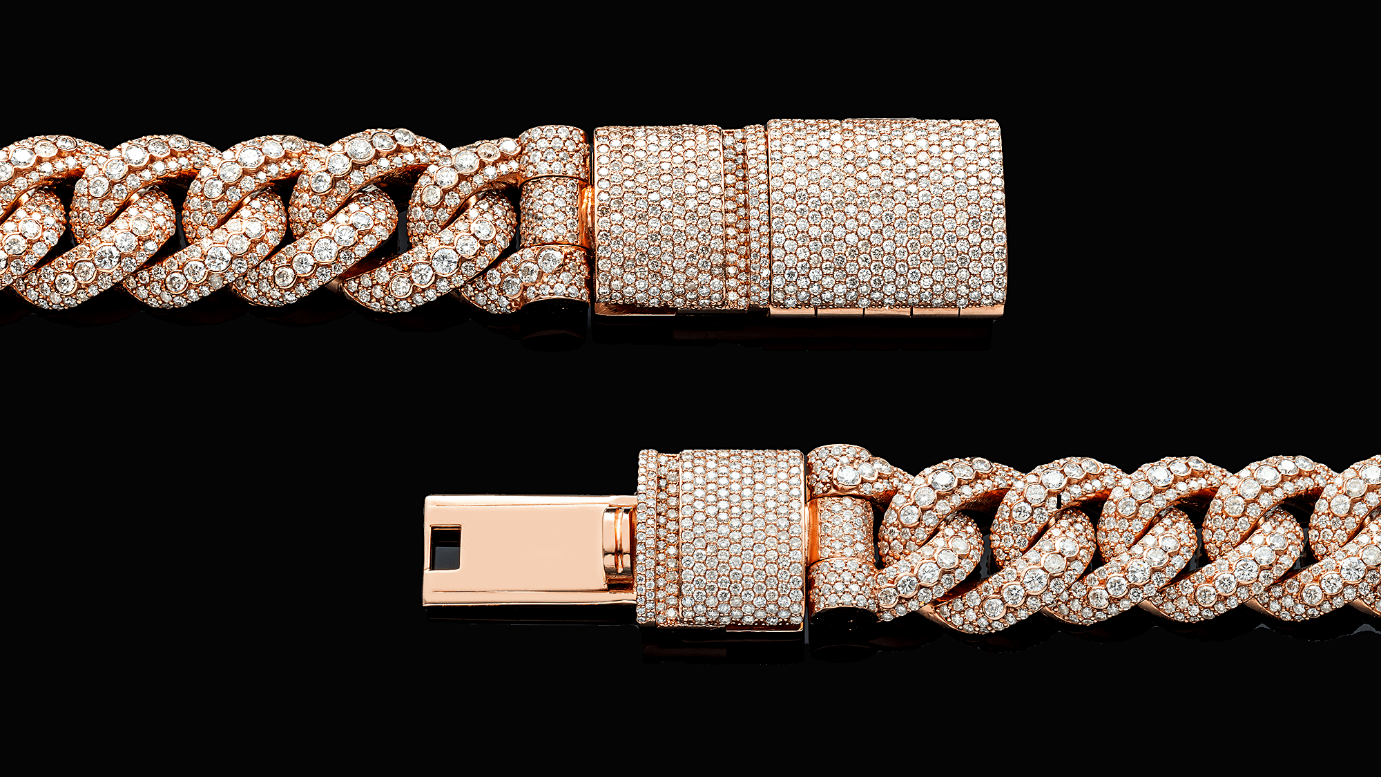 Rose gold chain bracelet with diamond accents on a black background