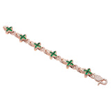 14K ROSE GOLD GREEN SAPPHIRE CROSS 12.33 CTW. DIAMOND BRACELET