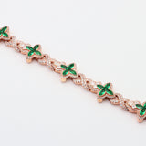 14K ROSE GOLD GREEN SAPPHIRE CROSS 12.33 CTW. DIAMOND BRACELET