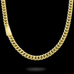 Gold chain necklace on a black background