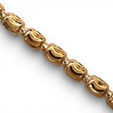 Pulsera de eslabones de píldora semirrígida de oro amarillo de 10K y 5.50 mm
