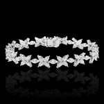 White Gold bracelet with butterfly-shaped diamonds on a black background