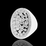 Diamond-encrusted ring on a black background