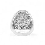 Silver ring with intricate design on a white background