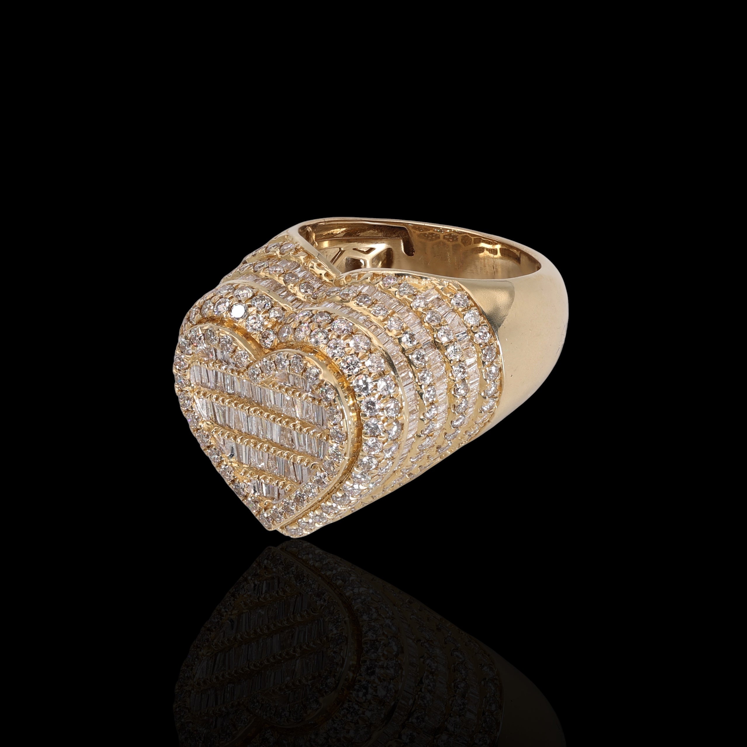front of Gold ring with Diamonds on a black background