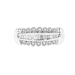 Diamond ring with baguette and round cut diamonds on a white background