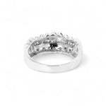 Silver ring with small stones on a white background