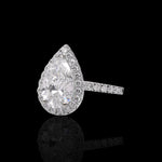 Pear-shaped diamond ring on a black background