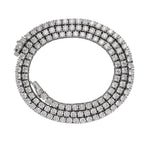 Diamond tennis bracelet on a white background in a spiral formation 