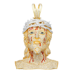Front of side view of Jesus Head Pendant a figure with gold and diamond details on a black background