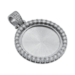 Silver pendant with clear diamonds on a white background