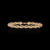 Yellow Gold Bracelet on a black background