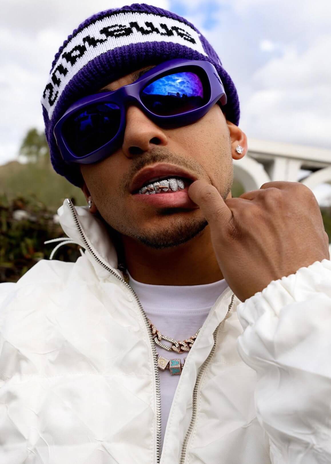 Ozuna wearing Custom made El Russo & Co Diamond Chains, Grillz and pendants.