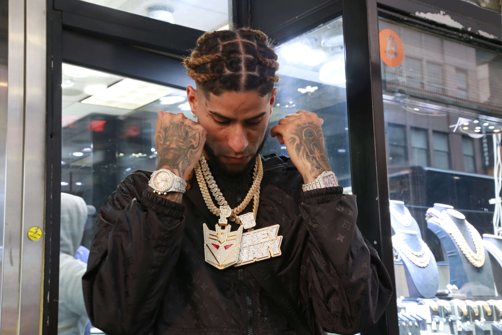 Yovngchimi at El Russo & Co Wearing Diamond & gold transformers pendant